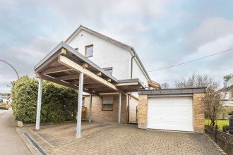 Hauptbild Komfortables Wohnen im Hochpaterre mit Garage in schöner Lage